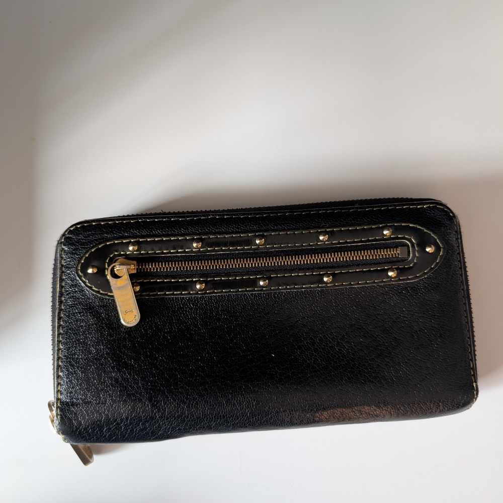 Louis Vuitton Black Suhali Leather Zippy Wallet
